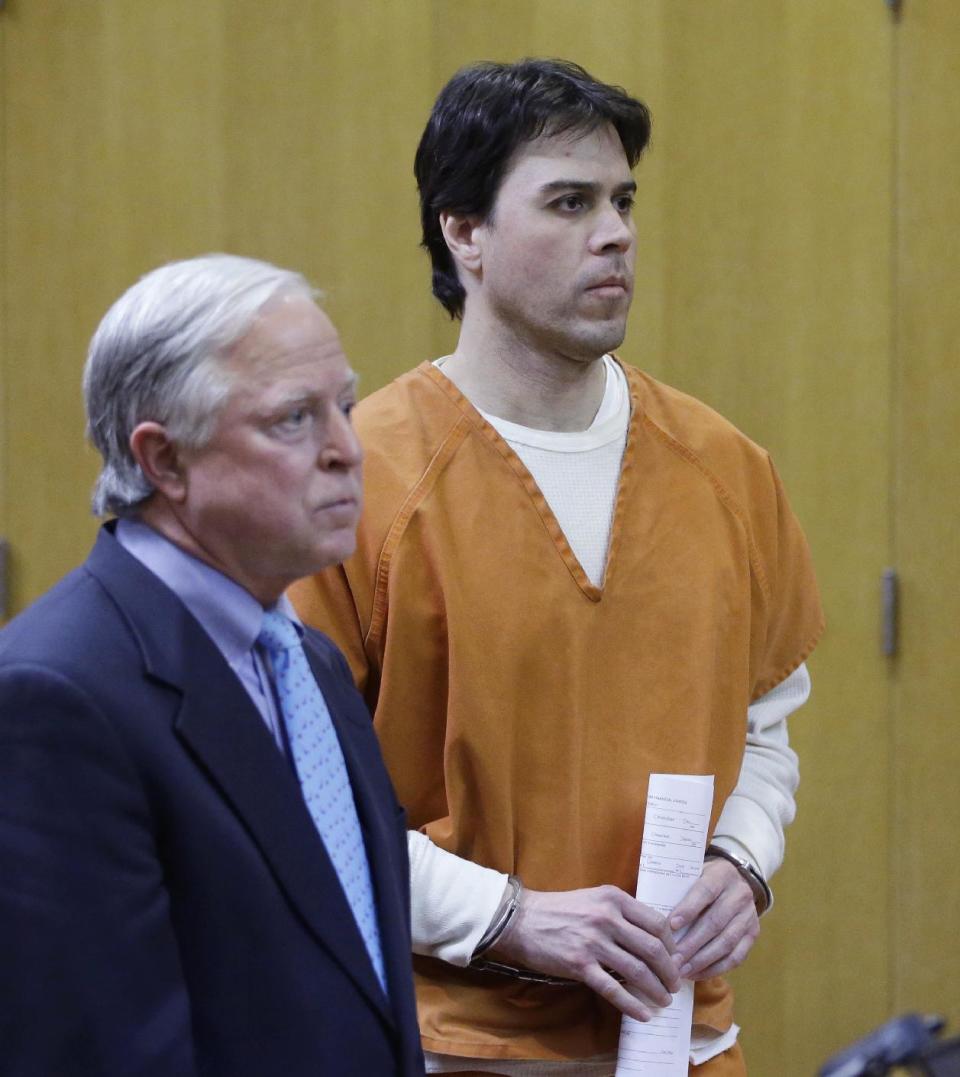 Raulie Casteel, right, stands with his attorney Doug Mullkoff in Oakland County Circuit Court in Pontiac, Mich., Tuesday, Feb. 4, 2014, during his sentencing. Casteel, 44, who opened fire on other motorists in a series of October 2012 attacks that terrified southeastern Michigan was sentenced to more than six years in prison in the first of two related cases. Judge Denise Langford Morris sentenced Raulie Casteel to serve from six years and eight months to 10 years in prison on multiple assault charges, as well as two years for weapons charges. The sentences will run concurrently. (AP Photo/Carlos Osorio)