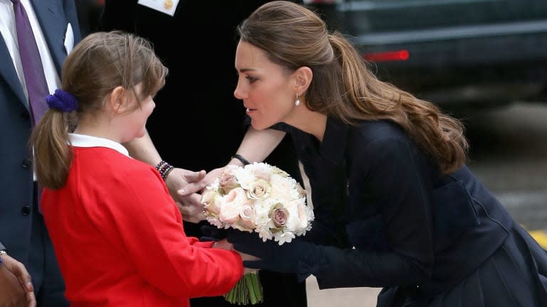 Kate Middleton accepting flowers