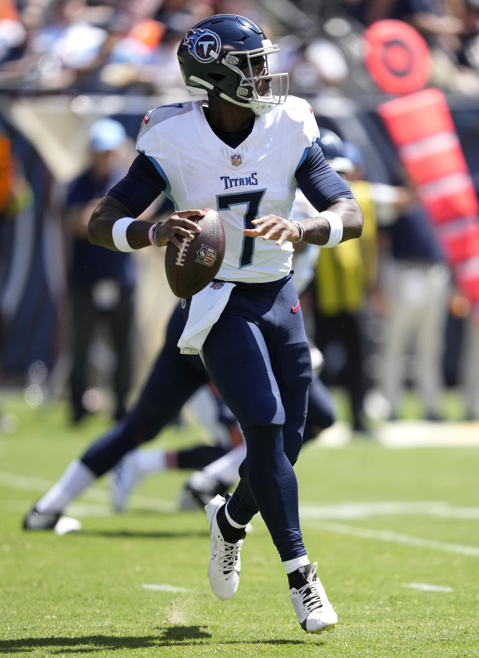 Tennessee Titans quarterback Malik Willis looks to throw against the Chicago Bears during the first half of an NFL preseason football game, Saturday, Aug. 12, 2023, in Chicago. (AP Photo/Charles Rex Arbogast)