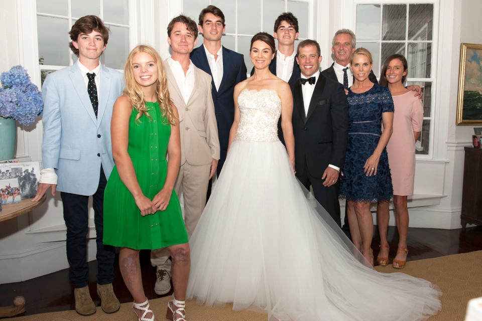<p>From left: Aiden Kennedy, Cat Young, Robert F. Kennedy III, Conor Kennedy, the bride, Finn Kennedy, the groom, Robert F. Kennedy Jr., Cheryl Hines and Kick Kennedy</p>