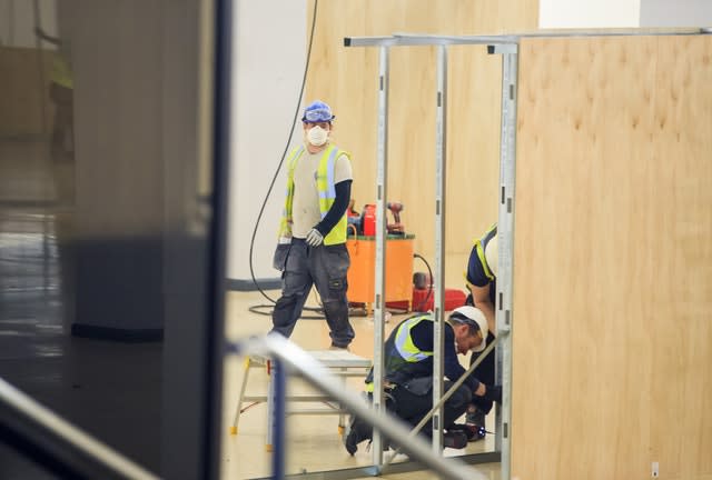 Workers in the conference centre