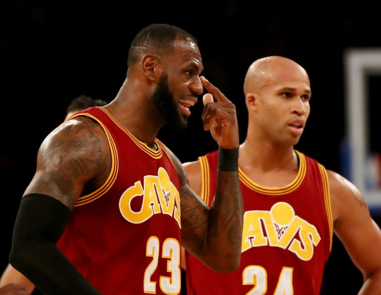 LeBron James of the Cleveland Cavaliers points to his eye after he was hit in the first half against the New York Knicks at Madison Square Garden