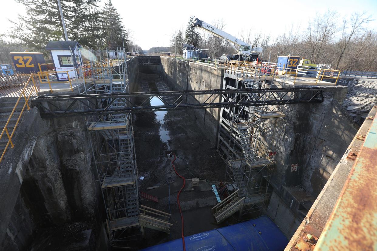 Lock 32 and Lock 33 in the Rochester area are considered high hazard dams in poor condition. The two locks are on the Erie Canal and are used to get boats from one area to another by having gates close and fill up with water raising or lowering the boats to get to a different section of the canal. Scaffolding is erected on both sides of one end of Lock 32.