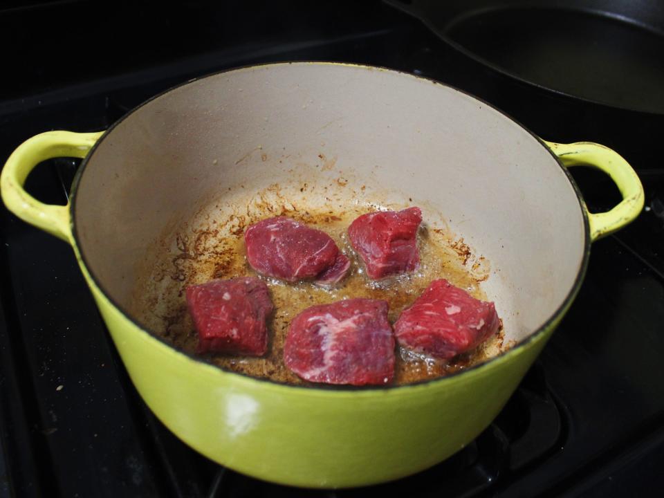 beef searing in the dutch oven