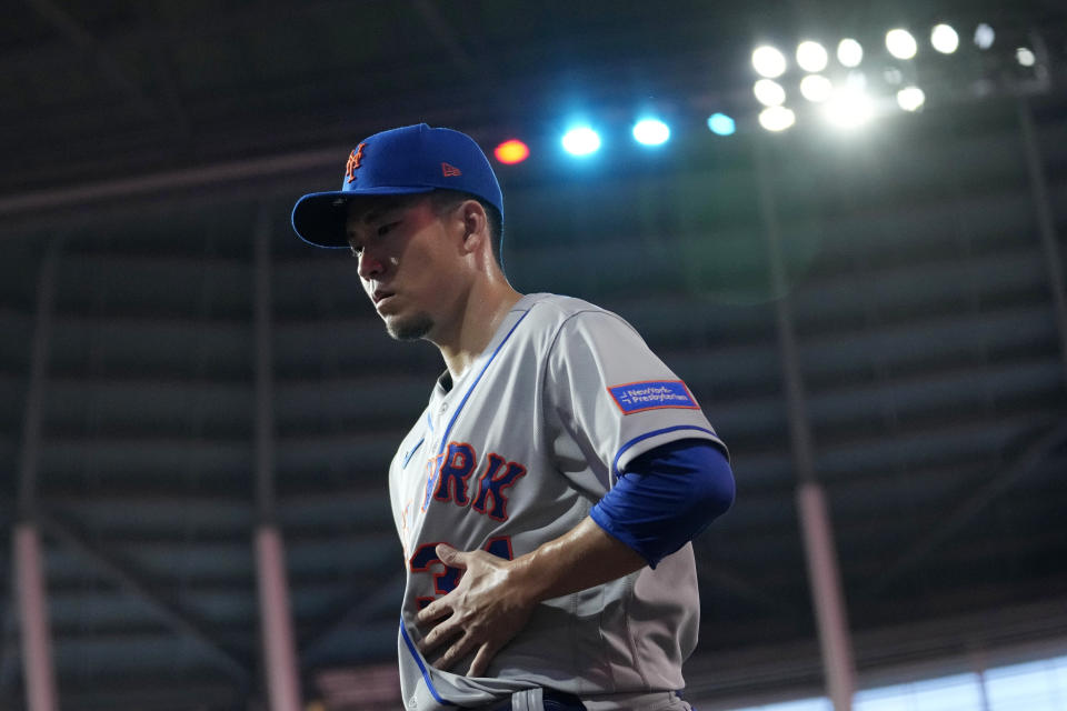 New York Mets starting pitcher Kodai Senga walks to the dugout before the team's baseball game against the Miami Marlins, Wednesday, Sept. 20, 2023, in Miami. (AP Photo/Lynne Sladky)