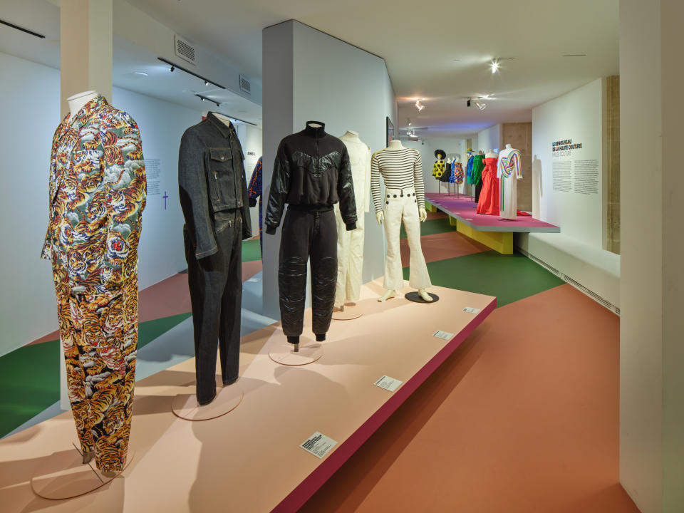 Designs by Kenzo Takada, Marithé Bachellerie and François Girbaud, Claude Montana, Thierry Mugler and Jean Paul Gaultier are among the fashion exhibits. 