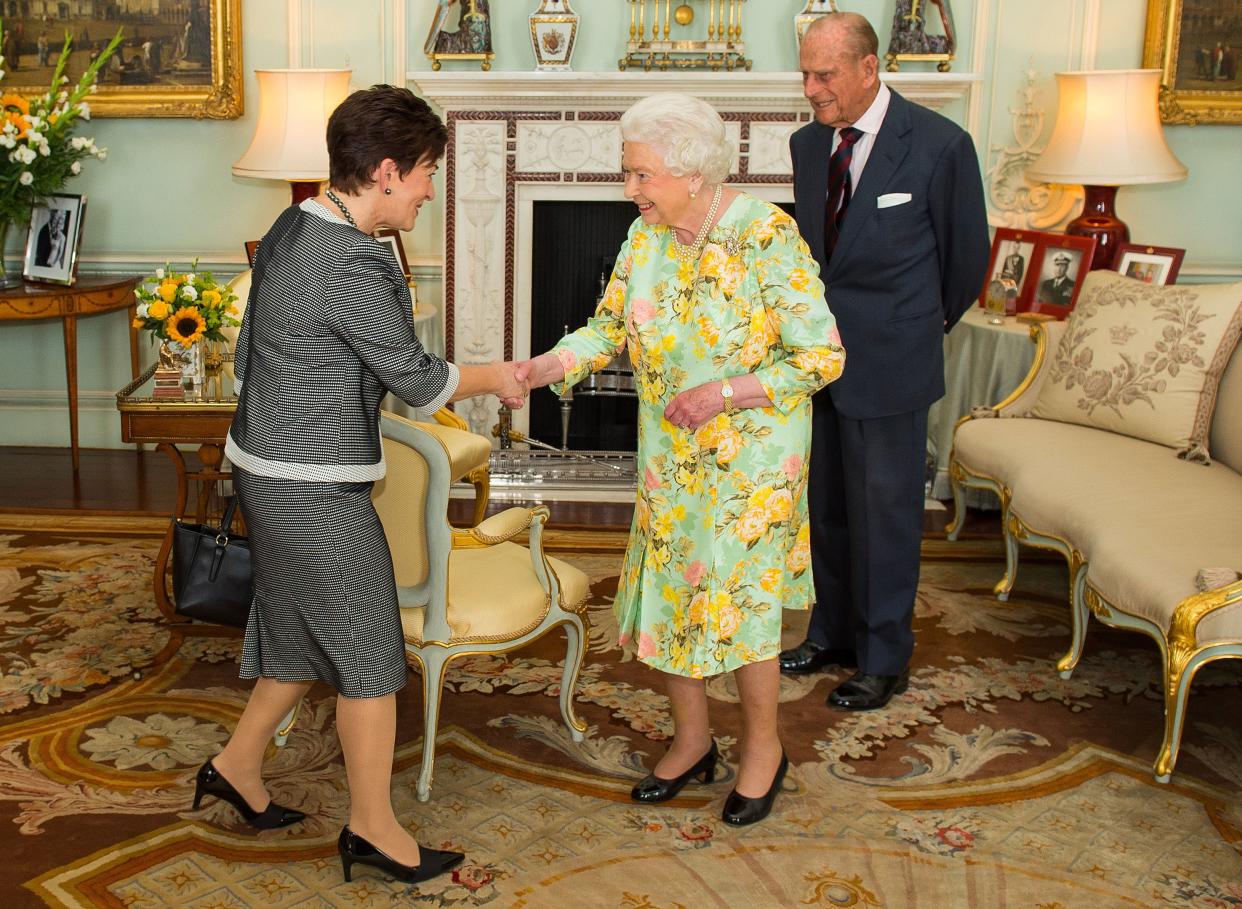 Britain's Queen Elizabeth II (2R) and her husband Britain's Prince Philip, Duke of Edinburgh (R) greet New Zealand's Governor-General designate, Dame Patricia 