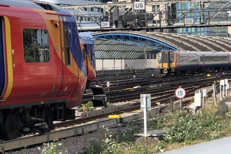 Commuters are facing major disruption on some of the UK’s busiest rail routes after a fire broke out near the lines of London's Waterloo Station. Shortly before rush hour nine platforms were closed, leaving passengers stranded in the concourse. It is thought the fire may have caused “significant damage” to a number of essential cables.Network Rail said its engineers would work through the night to fix the damage, but services were likely to be disrupted on Thursday morning.“We are very sorry for the disruption," a spokesman for Network Rail and South Western Railway said. “A lineside fire this morning caused significant damage to some of the rail infrastructure in the Waterloo area, fully closing platforms 16-24," he added, “Trains will be delayed or cancelled until the end of service today and disruption is likely to impact services tomorrow morning.“Passengers are strongly advised to check their journeys before travelling at http://www.southwesternrailway.com for ticket acceptance and service details.”Trains between London Waterloo, Hounslow, Richmond, Strawberry Hill and Kingston were cancelled, while services between Waterloo and Windsor & Eton Riverside were diverted via Kingston.> Waterloo station this evening, nightmare! pic.twitter.com/D9NV3qrj9O> > — William Laven (@WilliamLaven2) > > July 17, 2019Passengers were warned that services on other routes may also be subject to short-notice cancellations or delays.Additional reporting by Press Association