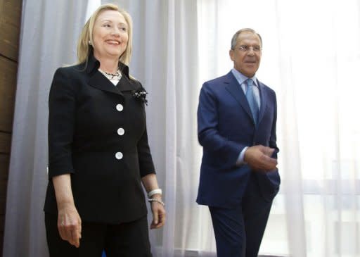 US Secretary of State Hillary Clinton (L) meets with Russian Foreign Minister Sergey Lavrov in St. Petersburg on the eve of international talks in Geneva to find a political solution to the Syrian crisis. Russia reported finding agreement with the United States on Syria and voiced optimism that crucial Geneva talks Saturday could bring a shift toward peace after 16 months of bloodshed