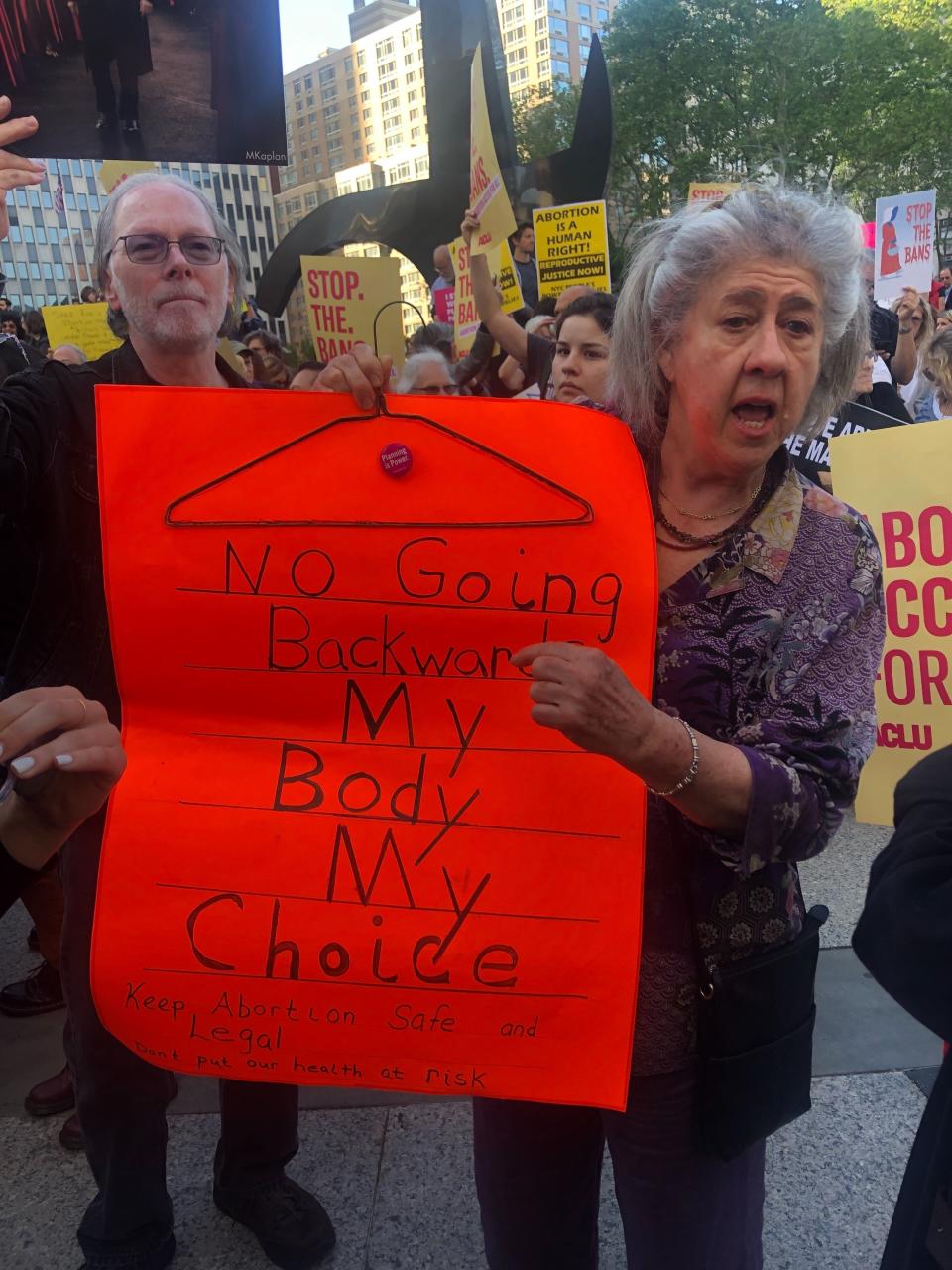 A protester at the Foley Square #StopTheBan rally in New York City. She told HuffPost that her mother fought for legalizing abortion and "now we're fighting to keep it for our grandchildren." (Photo: Emma Gray)