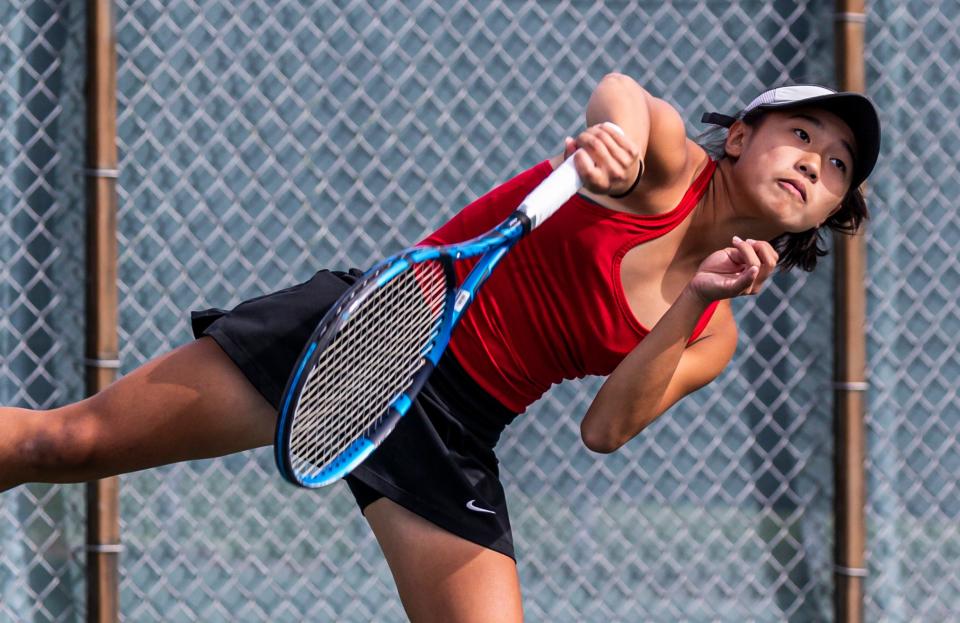 Muskego No. 1 doubles player Emily Pan serves during the Dick Arnold Tennis Championship in Waukesha last month.