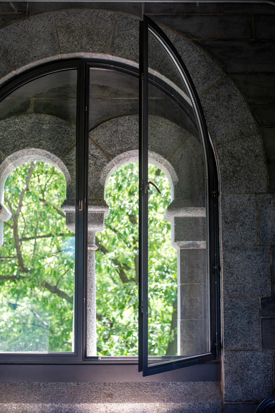 Clear glass panes honor the castle's original design.