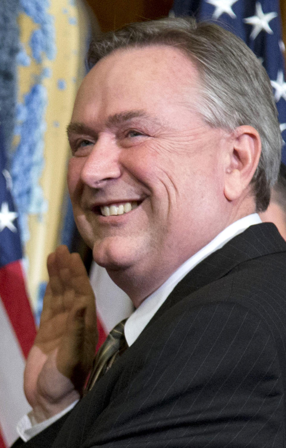 FILE - In this Jan. 3, 2013, file photo, Rep. Steve Stockman, R-Texas, right, participates in a mock swearing-in ceremony in Washington. Sen. John Cornyn spent nearly $5.5 million in the two months leading up to Texas’ Republican primary to help fend off a quixotic challenge from the right by renegade Congressman Stockman. (AP Photo/ Evan Vucci, File)