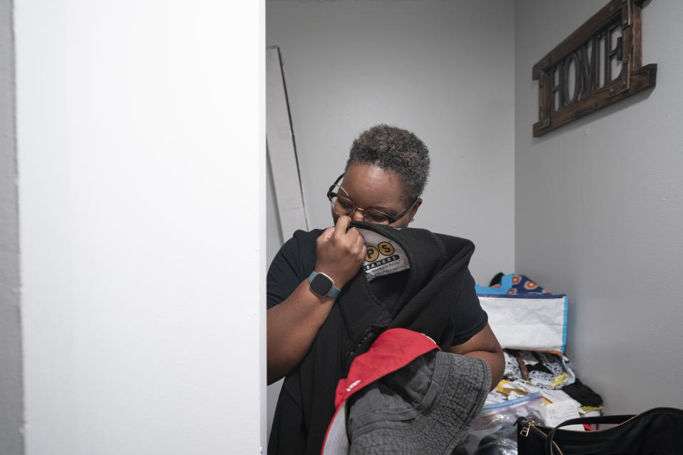 Melanese Marr-Thomas holds the fleece jacket of her late husband, Charles Thomas, which she still keeps in their coat rack at home in District Heights, Md., on Wednesday, Sept. 21, 2022. About 56% of Black adults have high blood pressure, compared to 48% of white people. By age 55, 3 in 4 African Americans are likely to develop the disorder. (AP Photo/Wong Maye-E)