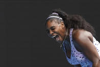 Serena Williams of the U.S. reacts as she plays China's Wang Qiang in their third round singles match at the Australian Open tennis championship in Melbourne, Australia, Friday, Jan. 24, 2020. (AP Photo/Lee Jin-man)