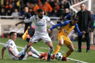 Soccer Football - Champions League - APOEL Nicosia vs Real Madrid - GSP Stadium, Nicosia, Cyprus - November 21, 2017 Apoel Nicosia’s Stathis Aloneftis in action with Real Madrid’s Dani Carvajal and Lucas Vazquez REUTERS/Alkis Konstantinidis