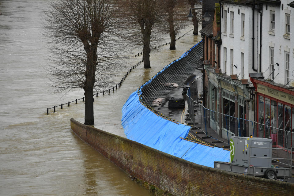 Temporary flood barriers hold back the river Severn in Ironbridge, Shropshire, in the aftermath of Storm Dennis. (Photo by Jacob King/PA Images via Getty Images)