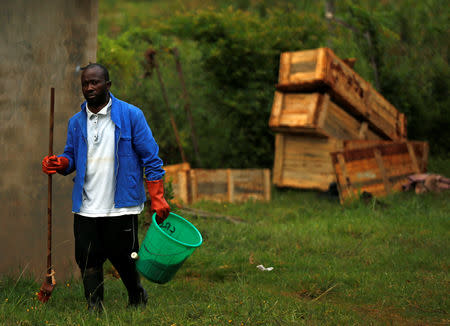 A cleaner works near a mortuary at Chimanimani rural district hospital, after Cyclone Idai, in Chimanimani, Zimbabwe, March 23, 2019. REUTERS/Philimon Bulawayo