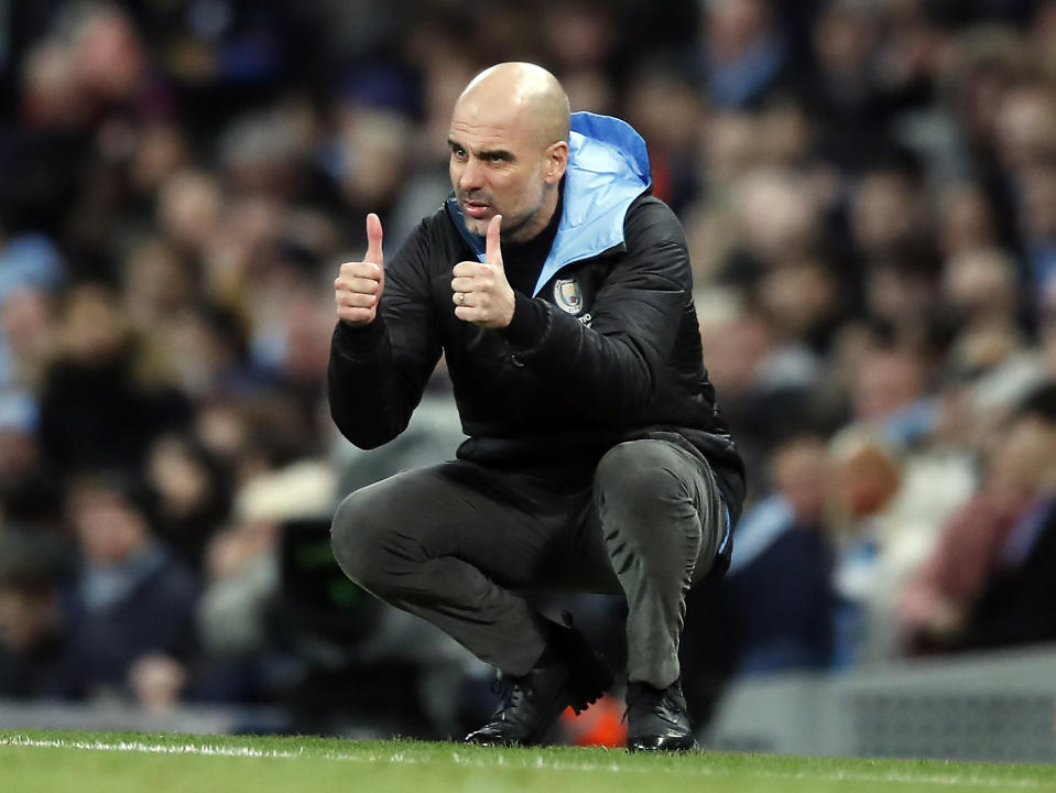 Pep Guardiola says he isn't leaving Manchester City anytime soon despite UEFA's Champions League ban. (Photo by Martin Rickett/PA Images via Getty Images)