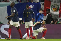 France's Kylian Mbappe kneels after he scored during the World Cup group D soccer match between France and Australia, at the Al Janoub Stadium in Al Wakrah, Qatar, Friday, Nov. 4, 2022. (AP Photo/Frank Augstein)