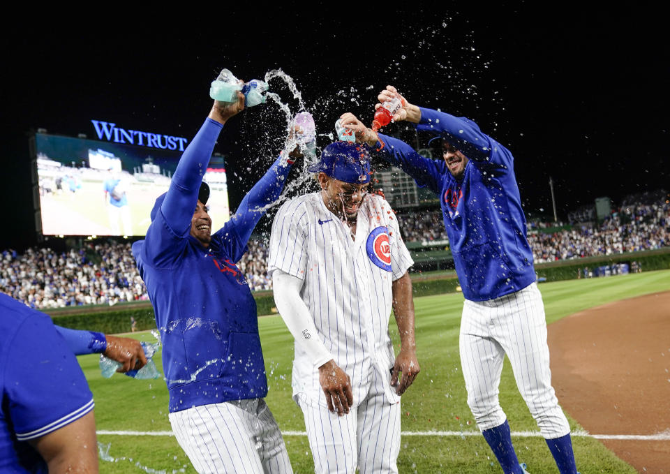 CHICAGO, ILLINOIS - AUGUST 16: Christopher Morel #5 of the Chicago Cubs is doused with Gatorade following a walk-off three-run home run against the Chicago White Sox at Wrigley Field on August 16, 2023 in Chicago, Illinois. The Cubs defeated the White Sox 4-3. (Photo by Nuccio DiNuzzo/Getty Images)