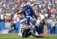 New England Patriots linebacker Kyle Van Noy tackles Buffalo Bills quarterback Josh Allen (17) as he scrambles in the first half of an NFL football game, Sunday, Sept. 29, 2019, in Orchard Park, N.Y. (AP Photo/Adrian Kraus)