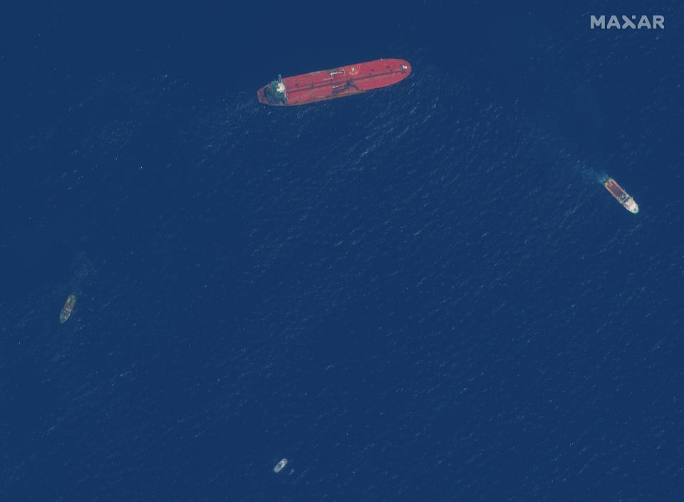 This satellite image provided by Maxar Technologies shows the oil tanker Front Altair off the coast of Fujairah, United Arab Emirates, Monday, June 17, 2019. New satellite photos released Monday show two oil tankers apparently attacked in the Gulf of Oman last week. The U.S. alleges Iran used limpet mines to strike the two tankers. Iran has denied being involved. (Satellite image ©2019 Maxar Technologies via AP)