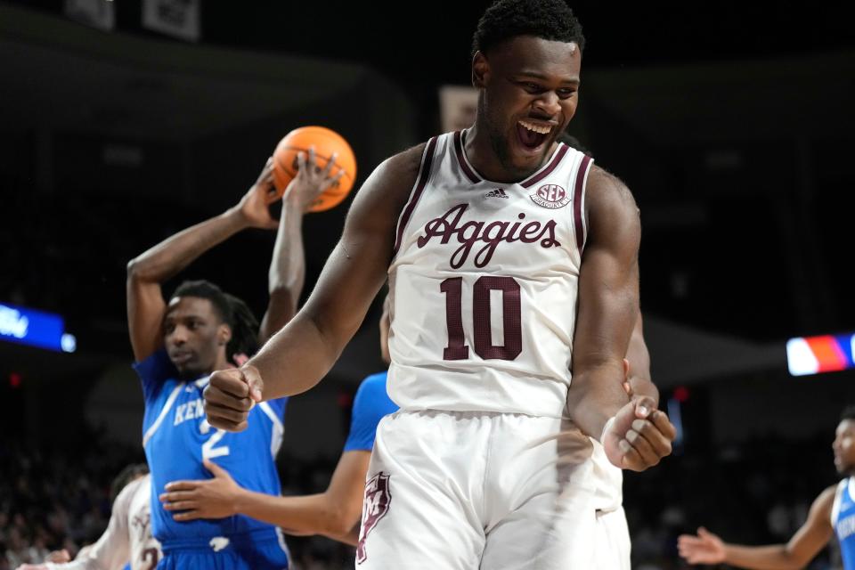 Texas A&M forward Wildens Leveque (10) reacts after being fouled while scoring a basket against Kentucky during the first half of an NCAA college basketball game Saturday, Jan. 13, 2024, in College Station, Texas. (AP Photo/Sam Craft)