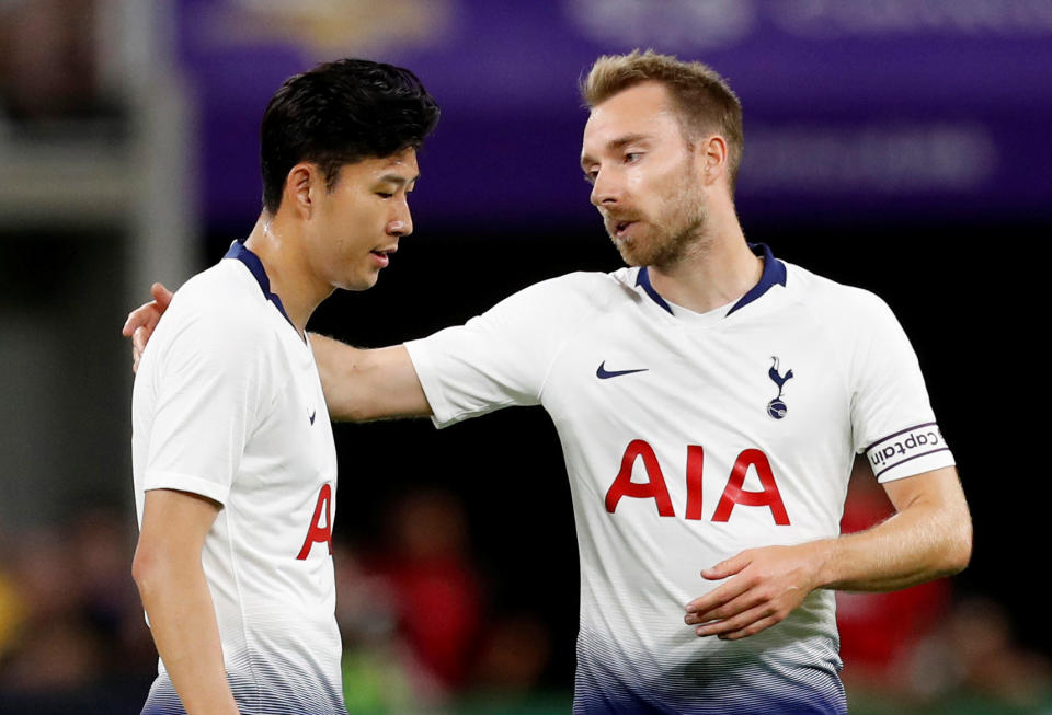 Tottenham Hotspur’s Son Heung-min speaks with Christian Eriksen REUTERS/Eric Miller