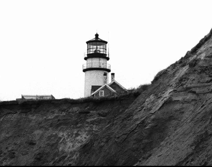 NORTH TRURO--In this January 1993 photo, Highland Light is located perilously close to the cliff's edge. In 1996, the lighthouse was moved 450 feet back from this spot.