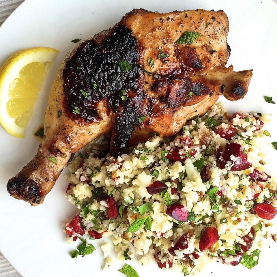 spicy chicken and cauliflower couscous with cherries, pistachios, and mint