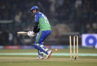 Multan Sultans batsman James Vince is bowled by Islamabad United pacer Amad Butt during their Pakistan Super League T20 cricket match at Gaddafi stadium in Lahore, Pakistan, Saturday, Feb. 22, 2020. (AP Photo/K.M. Chaudary)