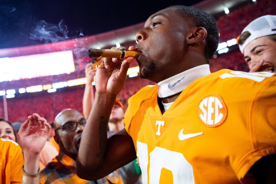 Tennessee wide receiver Squirrel White (10) smokes a cigar after Tennessee's game against Alabama in Neyland Stadium in Knoxville, Tenn., on Saturday, Oct. 15, 2022.
