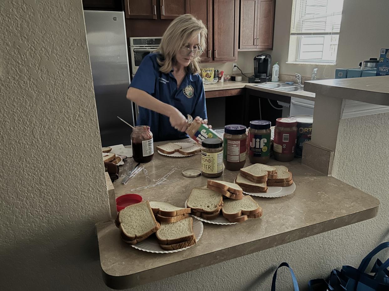 Rep. Allison Tant, D-Tallahassee, makes peanut butter and jelly sandwiches at the Brookestone Senior Living apartment complex in Tallahassee on Monday morning, May 13, 2024.