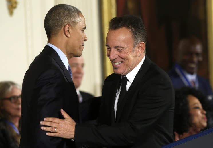 Musician Bruce Springsteen thanks President Obama for his Presidential Medal of Freedom during a ceremony in the East Room of the White House, Nov. 22, 2016. (Yuri Gripas/Reuters)