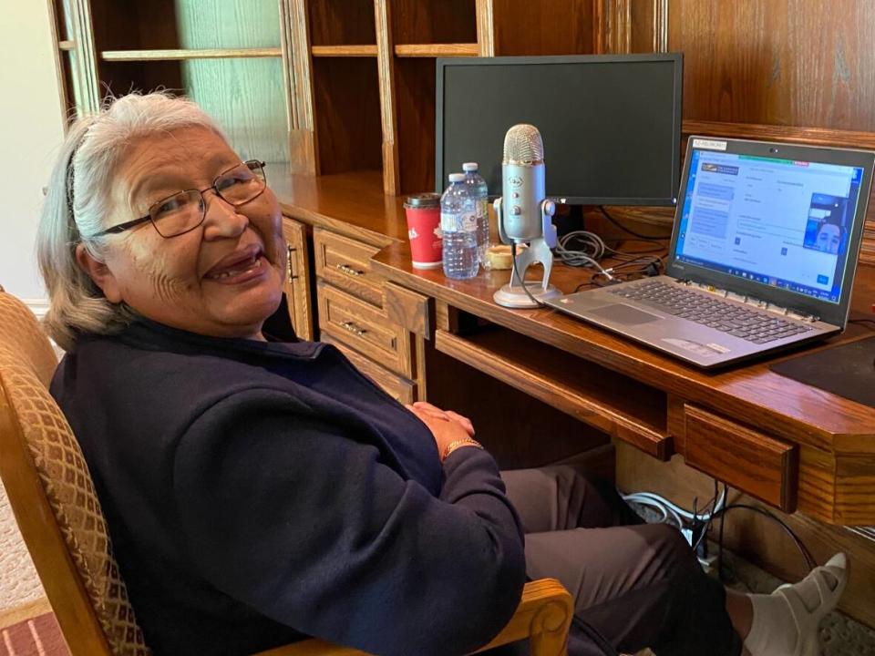 Stoney elder Winnifred Beaver works remotely on a language preservation and education project. (The Language Conservancy - image credit)