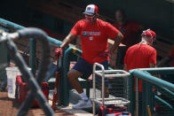 Washington Nationals' manager David Martinez looks out from the dugout during a baseball training camp workout at Nationals Stadium, Sunday, July 5, 2020, in Washington. (AP Photo/Carolyn Kaster)