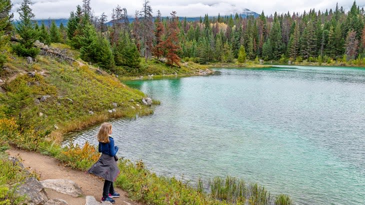 <span class="article__caption">An 11-year-old girl gazes at the water in Valley of the Five Lakes, Jasper National Park, Canada.</span> (Photo: Stefan Cristian Cioata/Getty)