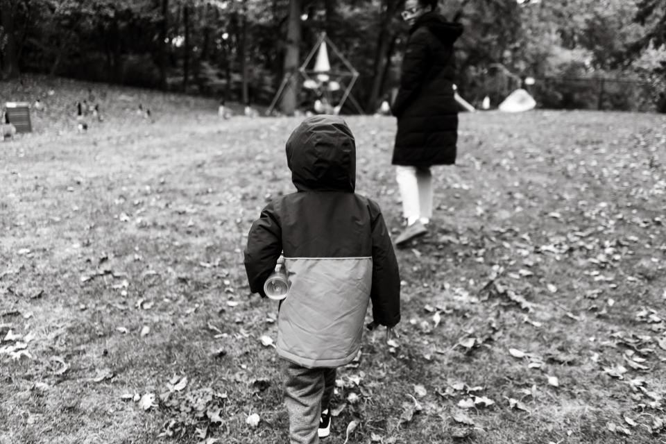 Morine Cebert and her son, Beau, romp at his favorite park in Stratford, Conn., on Halloween. (Anastassia Whitty for The Washington Post)