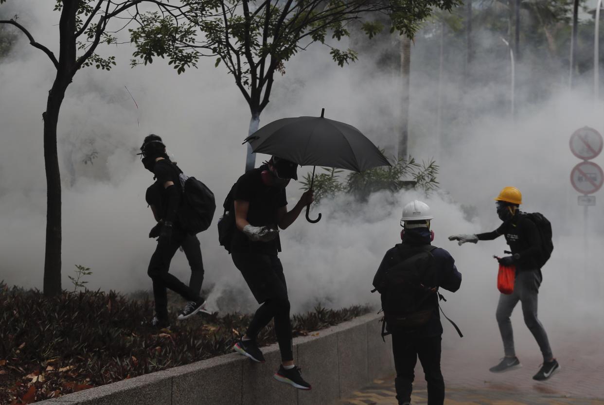 Police use tear gas to disperse protestors in Hong Kong, on 6 October, 2019. (AP file photo)