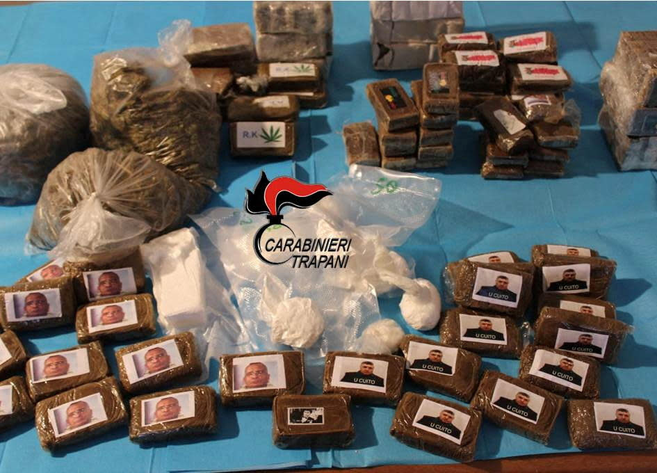 Drug packages decorated with pictures of Sicilian Mafia bosses Salvatore Riina and Matteo Messina Denaro, and the notorious character of The Godfather are displayed in Marsala, Italy, March 21, 2023.  / Credit: arabinieri/Handout via REUTERS