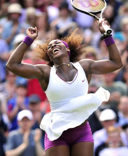 US player Serena Williams celebrates her women's singles semi-final victory over Belarus's Victoria Azarenka on day 10 of the 2012 Wimbledon Championships tennis tournament at the All England Tennis Club in Wimbledon, southwest London. Williams and Agnieszka Radwanksa will meet in Saturday's Wimbledon final