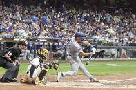 Los Angeles Dodgers' Austin Barnes hits a home run during the sixth inning of a baseball game Wednesday, Aug. 17, 2022, in Milwaukee. (AP Photo/Morry Gash)