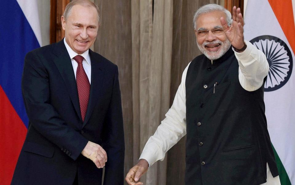 Prime Minister Modi's alliance with Putin complicates any co-operation with the West - AP Photo/Press Trust of India