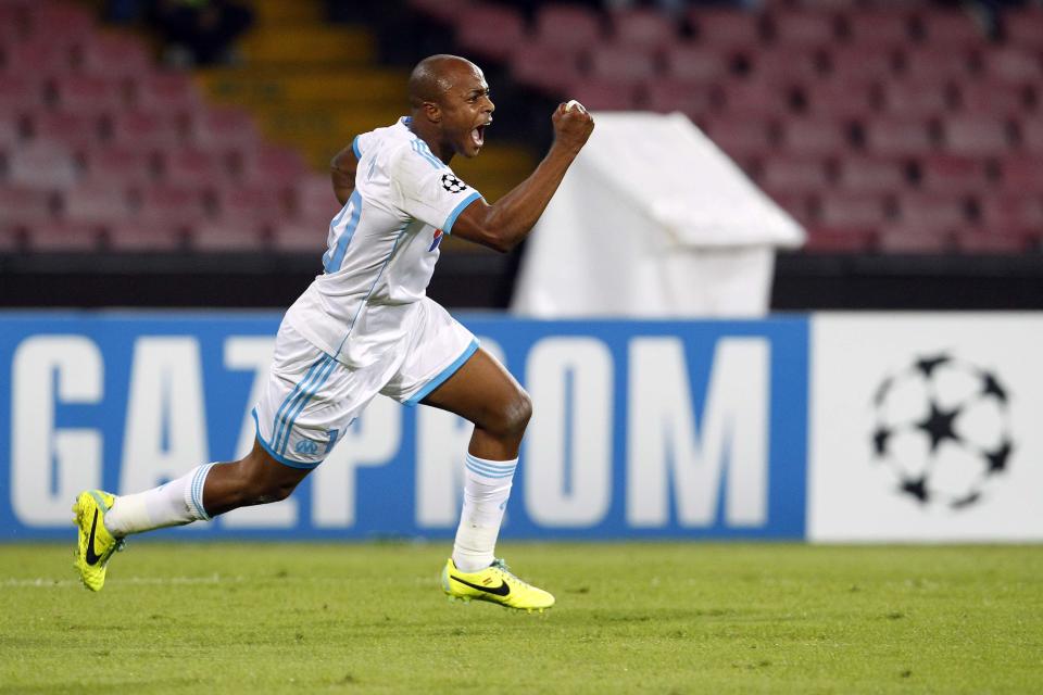 Olympique Marseille's Andre Ayew celebrates after scoring against Napoli during their Champions League soccer match at San Paolo stadium in Naples November 6, 2013. REUTERS/Giampiero Sposito (ITALY - Tags: SPORT SOCCER)