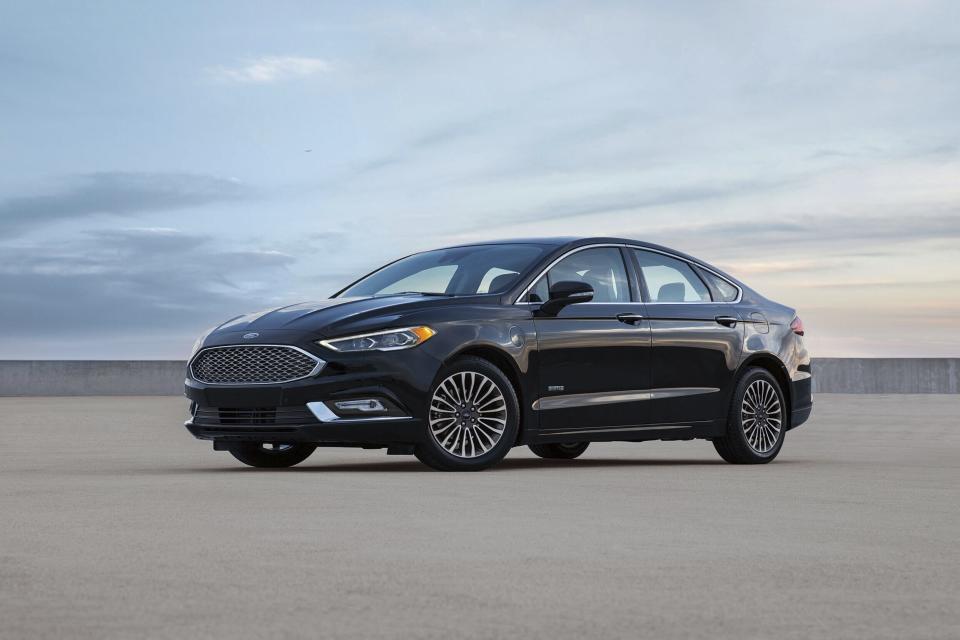 This photo provided by Ford shows a 2017 Fusion Energi. The Energi is the plug-in version of the regular Fusion Hybrid sedan. It has an EPA-estimated all-electric range of 21 miles. (Courtesy of Ford Motor Co. via AP)