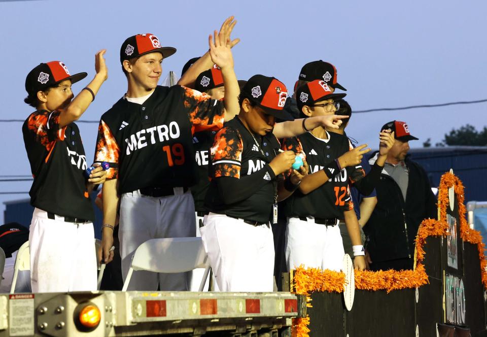 The Metro Region champion Little League team from Smithfield participates in the Grand Slam Parade on Monday in Williamsport, Pa. The Little League World Series tournament starts on Wednesday.