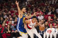 May 20, 2019; Portland, OR, USA; Portland Trail Blazers guard CJ McCollum (3) drives to the basket against Golden State Warriors guard Stephen Curry (30) during the first half in game four of the Western conference finals of the 2019 NBA Playoffs at Moda Center. Mandatory Credit: Troy Wayrynen-USA TODAY Sports