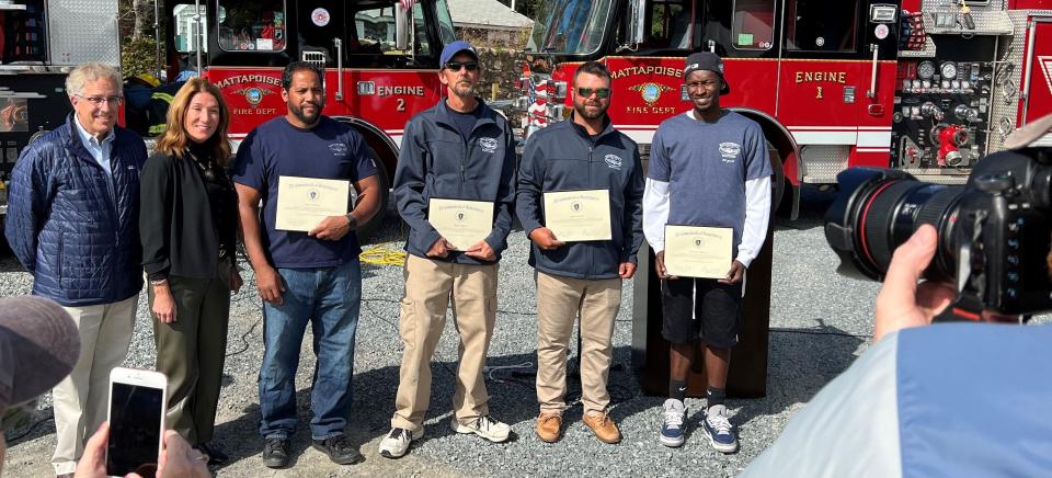 "Unsung heroes" Jacey Yancey, Roger Reed, Jake Clarke, Trevellis Oliver are photographed with Lt. Gov. Karyn Polito, and state Rep. Bill Straus.