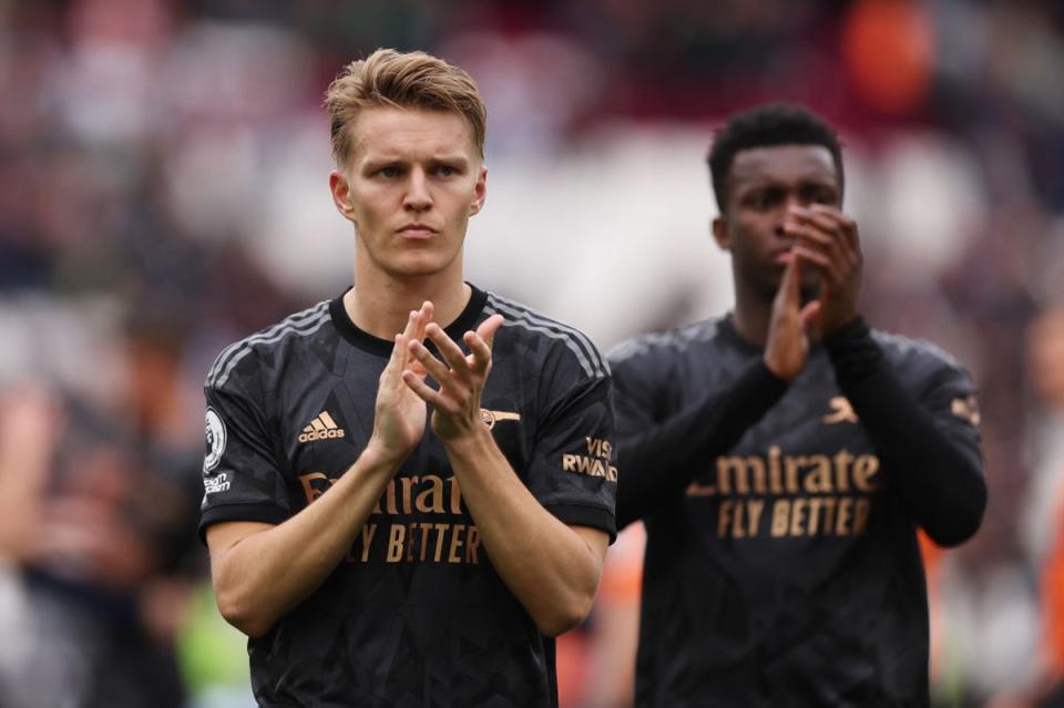 Martin Odegaard claps to the fans after his side’s draw on Sunday (Getty)